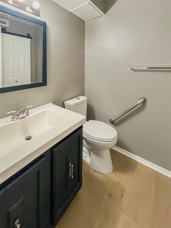 4001 South Beneva Road, Unit 416 Sarasota, FL 34233 - Photo 16 of 19 a bathroom with a sink and a toilet