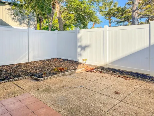 a view of a backyard of the house