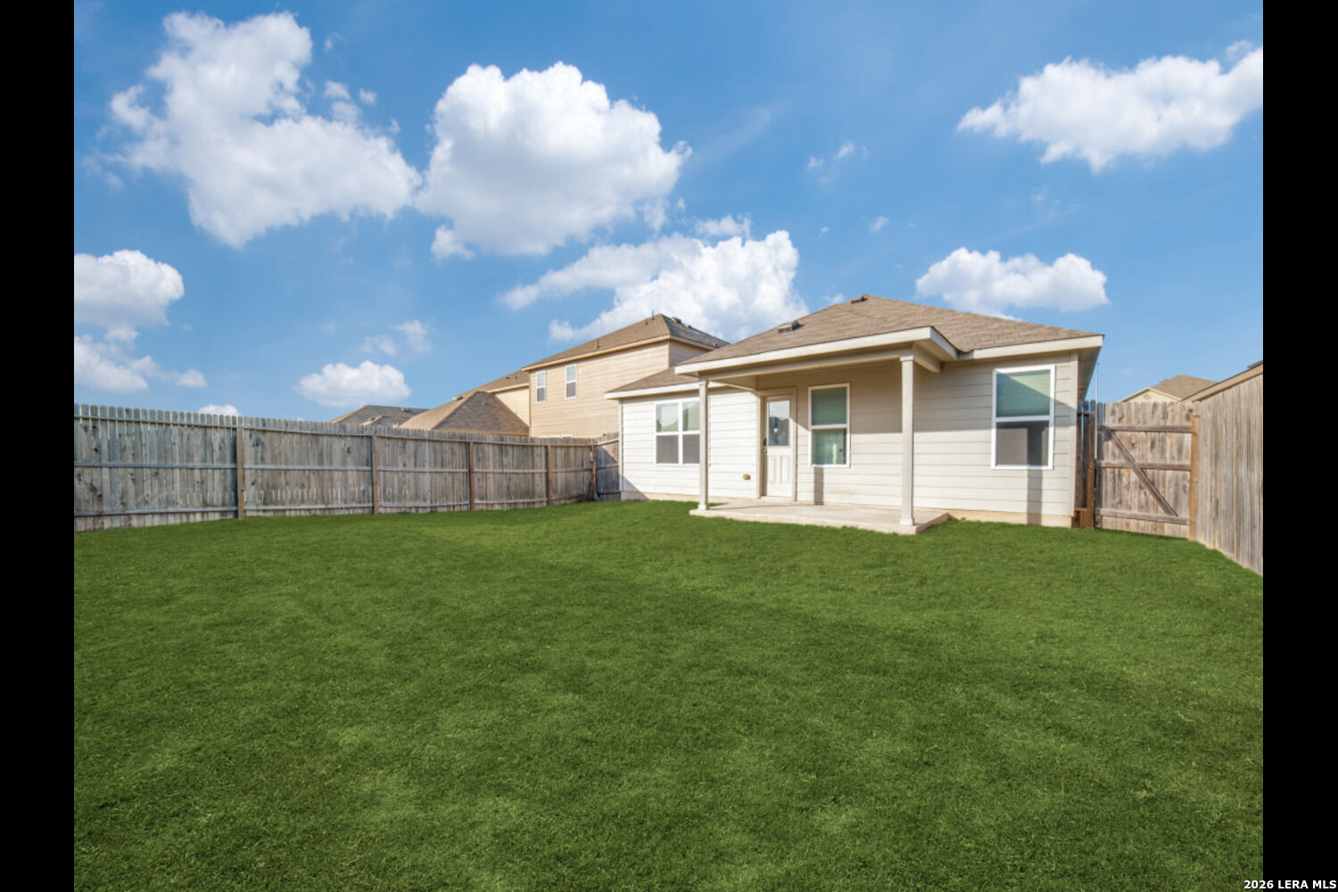 2426 Rainbow Basin Converse, TX 78109 - Photo 12 of 12 a view of a house with a backyard