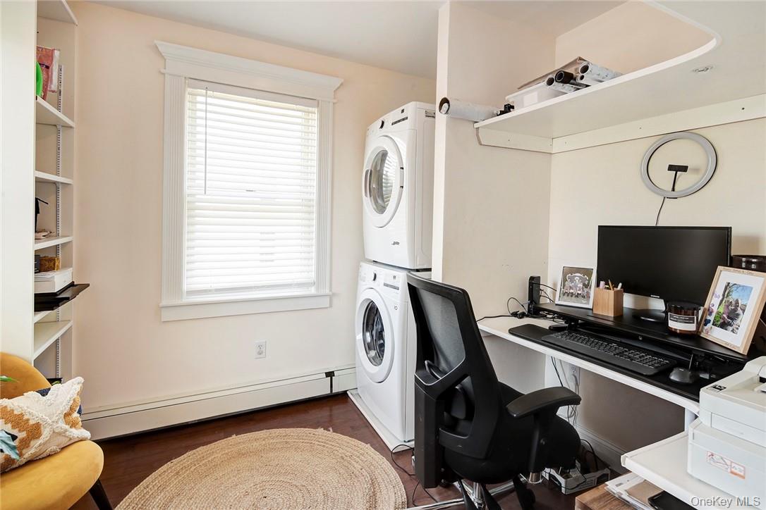 8 Horton Street Rye, NY 10580 - Photo 16 of 24 Second Lndry Rm/Office area with a baseboard radiator, stacked washer / dryer, storage..off Primary Bdrm