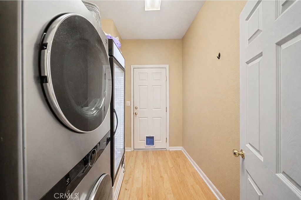 7606 Isla Street Hemet, CA 92545 - Photo 16 of 41 a close view of a utility room with washer and dryer