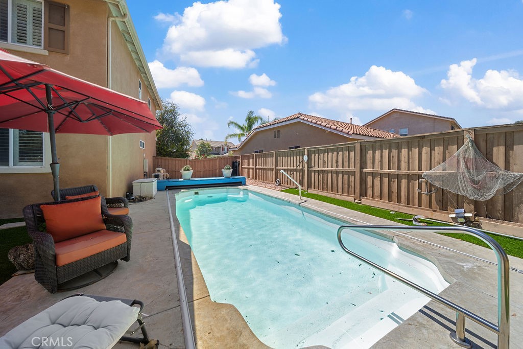 7606 Isla Street Hemet, CA 92545 - Photo 28 of 41 a view of a house with backyard and sitting area