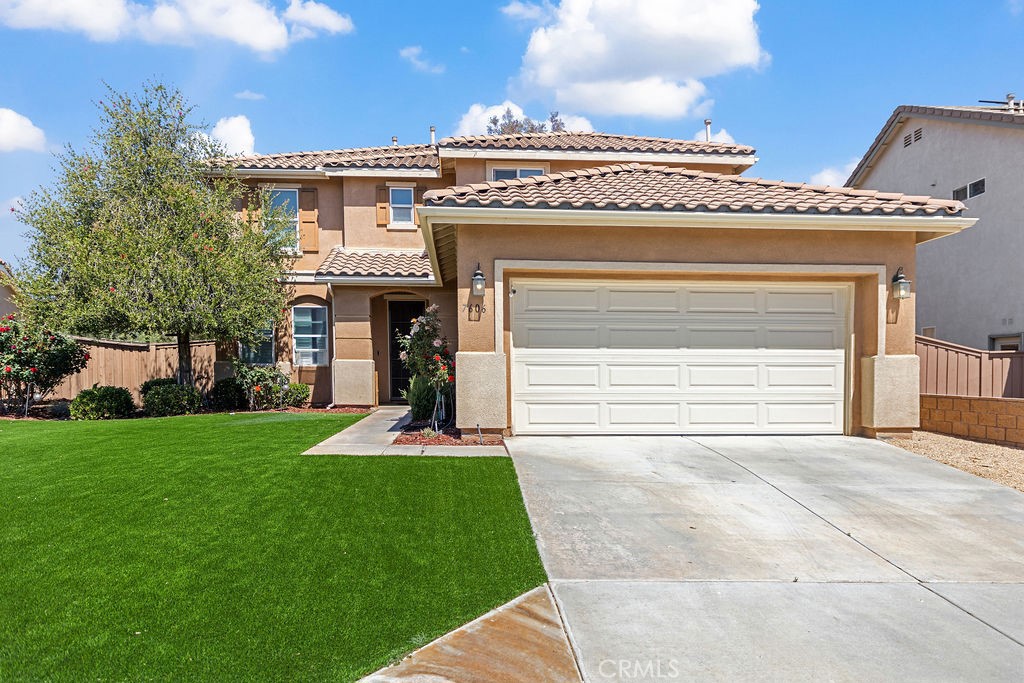 7606 Isla Street Hemet, CA 92545 - Photo 32 of 41 a view of a house with a yard