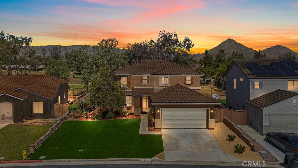 7606 Isla Street Hemet, CA 92545 - Photo 33 of 41 a front view of a house with a yard