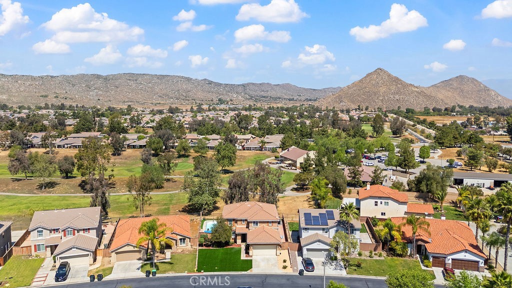 7606 Isla Street Hemet, CA 92545 - Photo 37 of 41 an aerial view of residential houses with outdoor space and a lake view