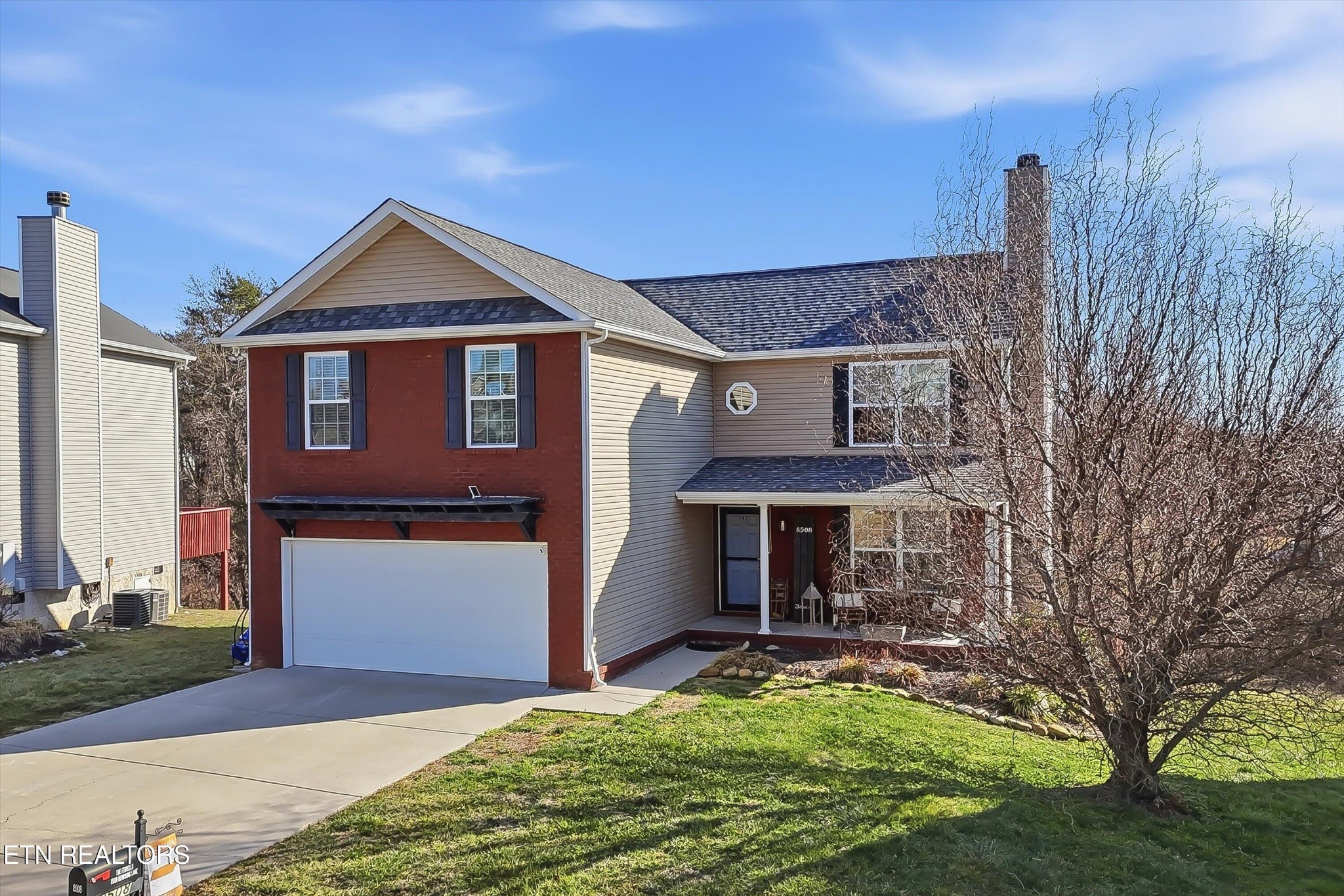 8508 Bowsong Lane Powell, TN 37849 - Photo 28 of 28 a front view of a house with a yard