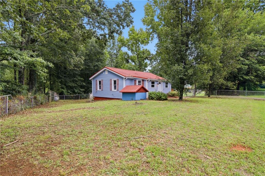 6815 Bannister Road Cumming, GA 30028 - Photo 4 of 35