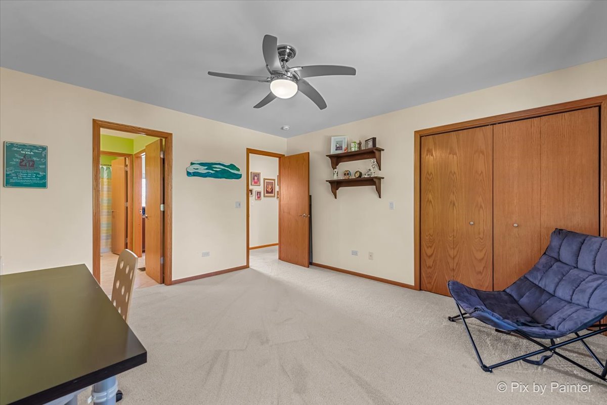 3720 Cypress Drive Spring Grove, IL 60071 - Photo 27 of 55 a view of a livingroom with furniture and a ceiling fan