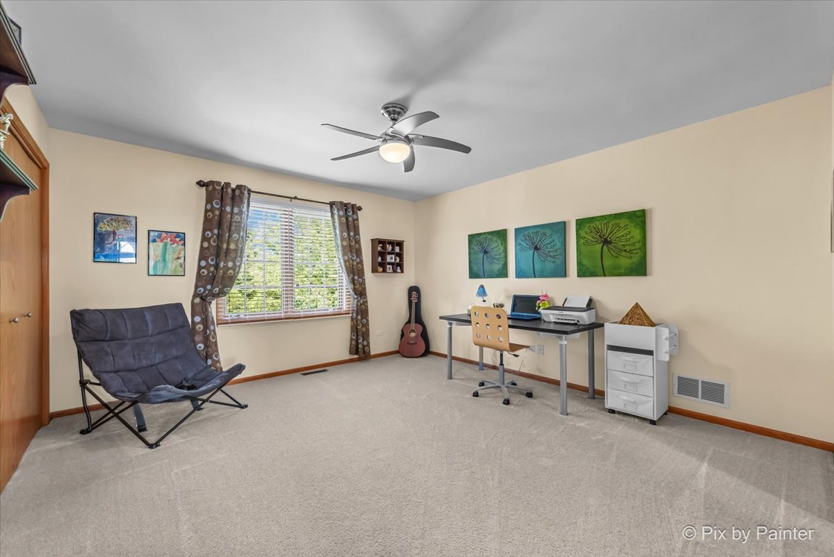 3720 Cypress Drive Spring Grove, IL 60071 - Photo 28 of 55 a living room with furniture and a piano table