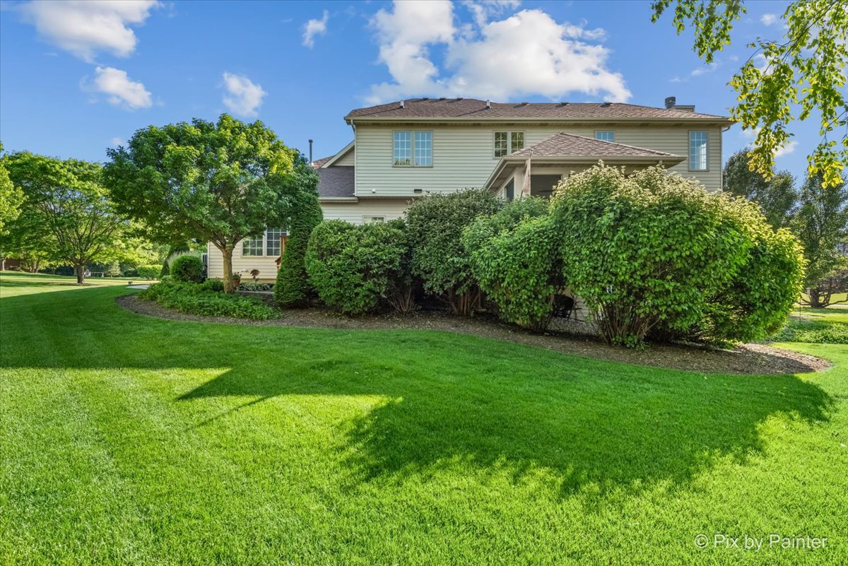 3720 Cypress Drive Spring Grove, IL 60071 - Photo 45 of 55 a view of a house with a garden