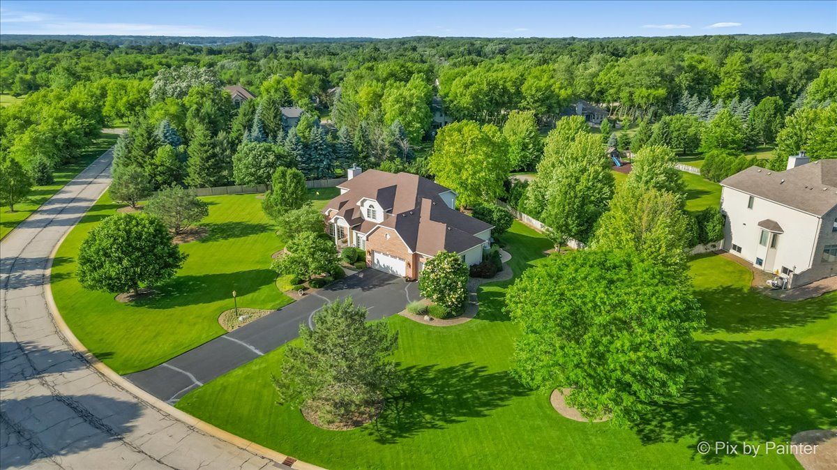 3720 Cypress Drive Spring Grove, IL 60071 - Photo 48 of 55 an aerial view of a house with a yard