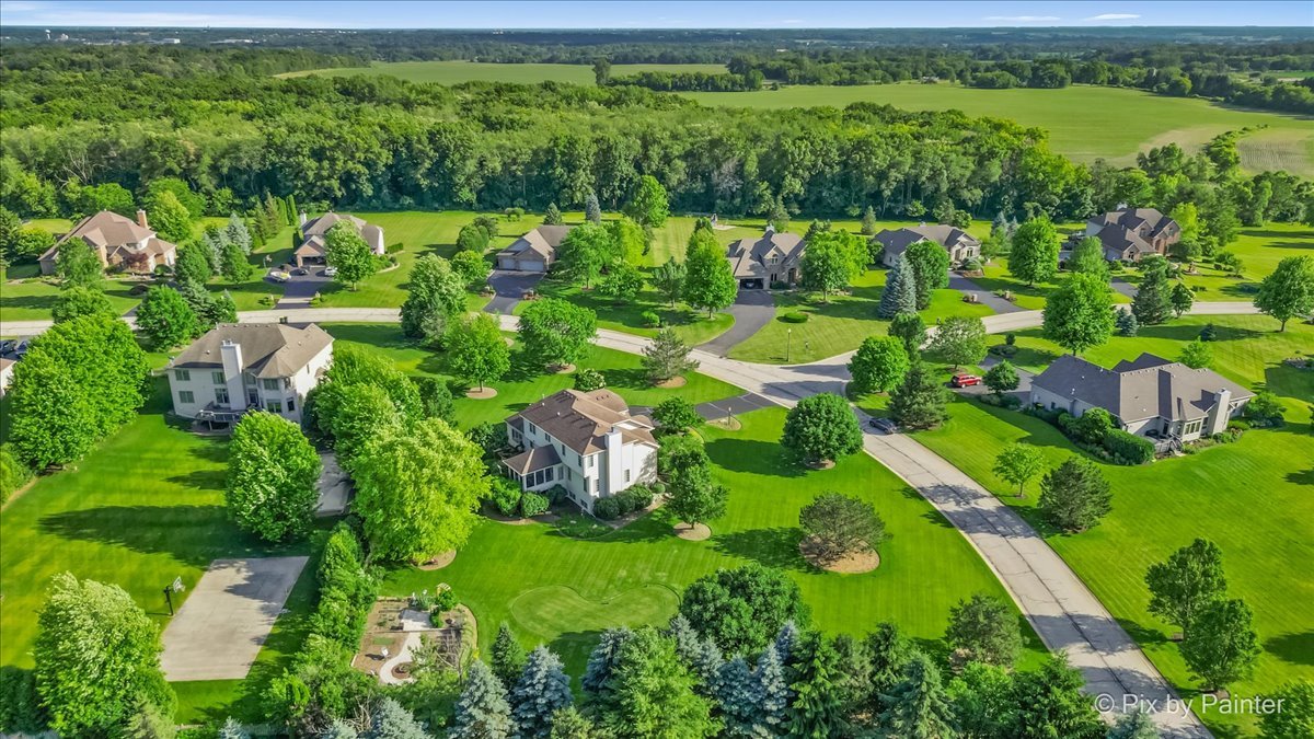 3720 Cypress Drive Spring Grove, IL 60071 - Photo 52 of 55 an aerial view of a house with a yard