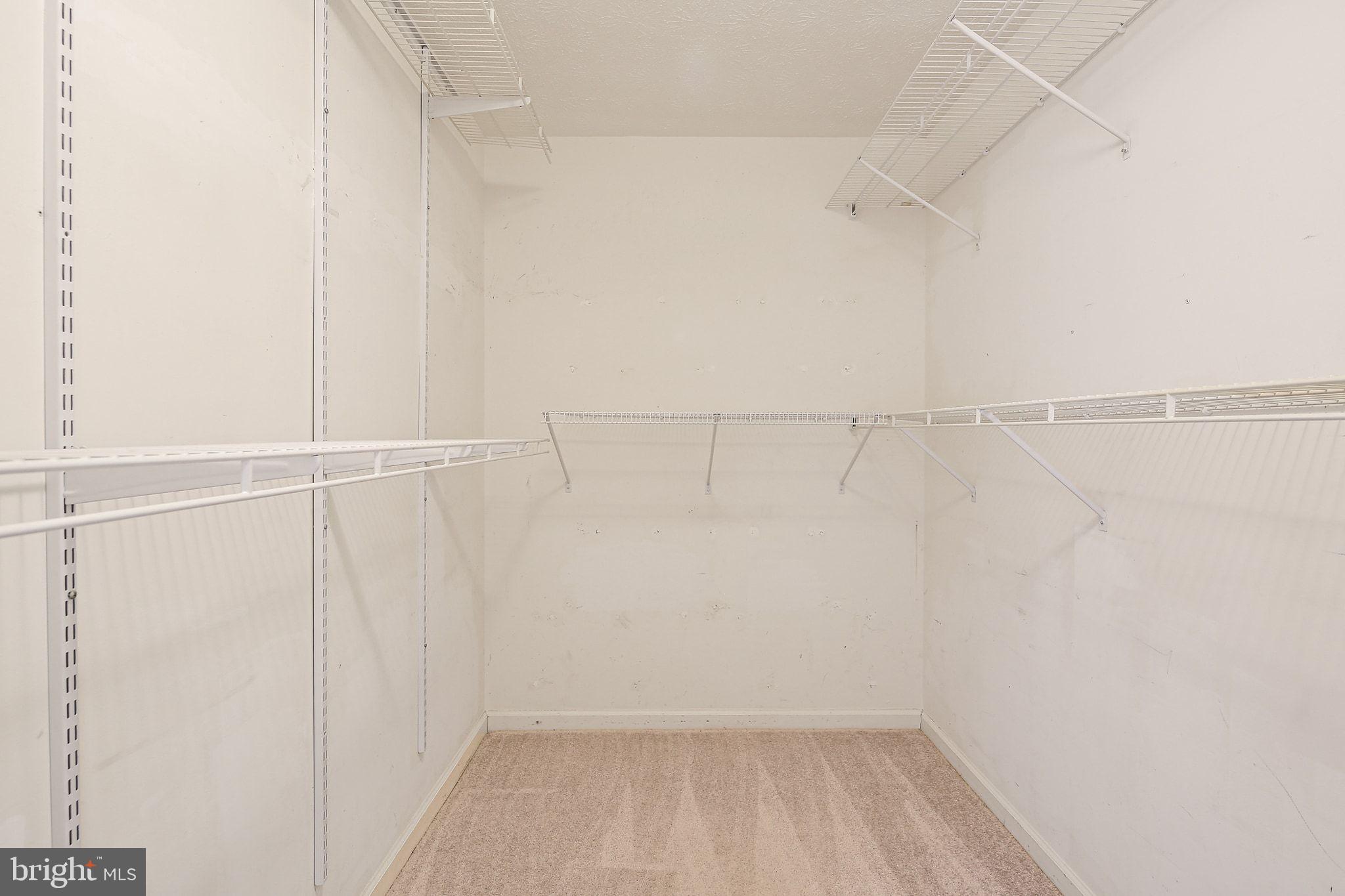 322 Timberbrook Court Odenton, MD 21113 - Photo 19 of 31 a view of a room with racks on the wall