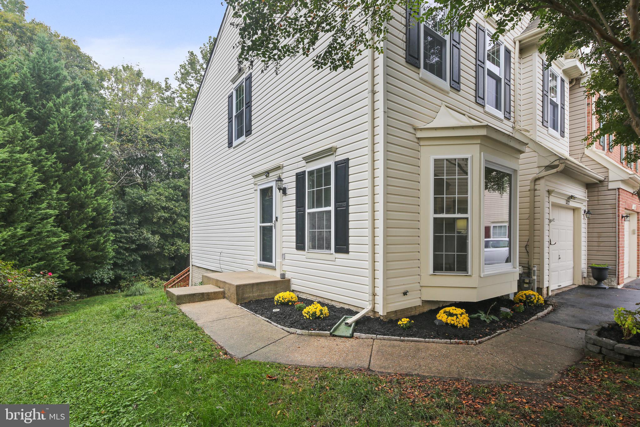 322 Timberbrook Court Odenton, MD 21113 - Photo 2 of 31 a view of a house with a yard