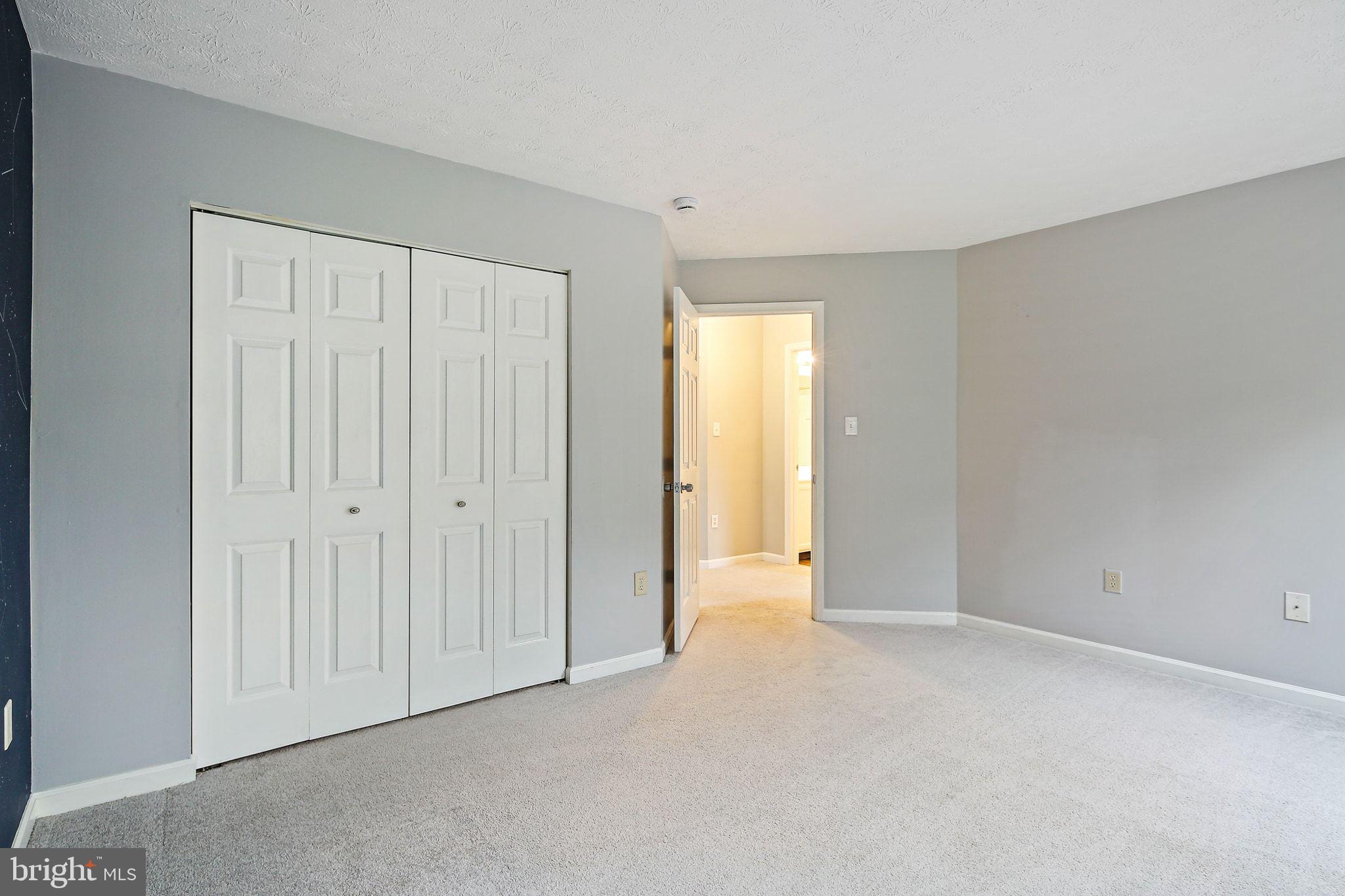 322 Timberbrook Court Odenton, MD 21113 - Photo 23 of 31 a view of an empty room and closet area