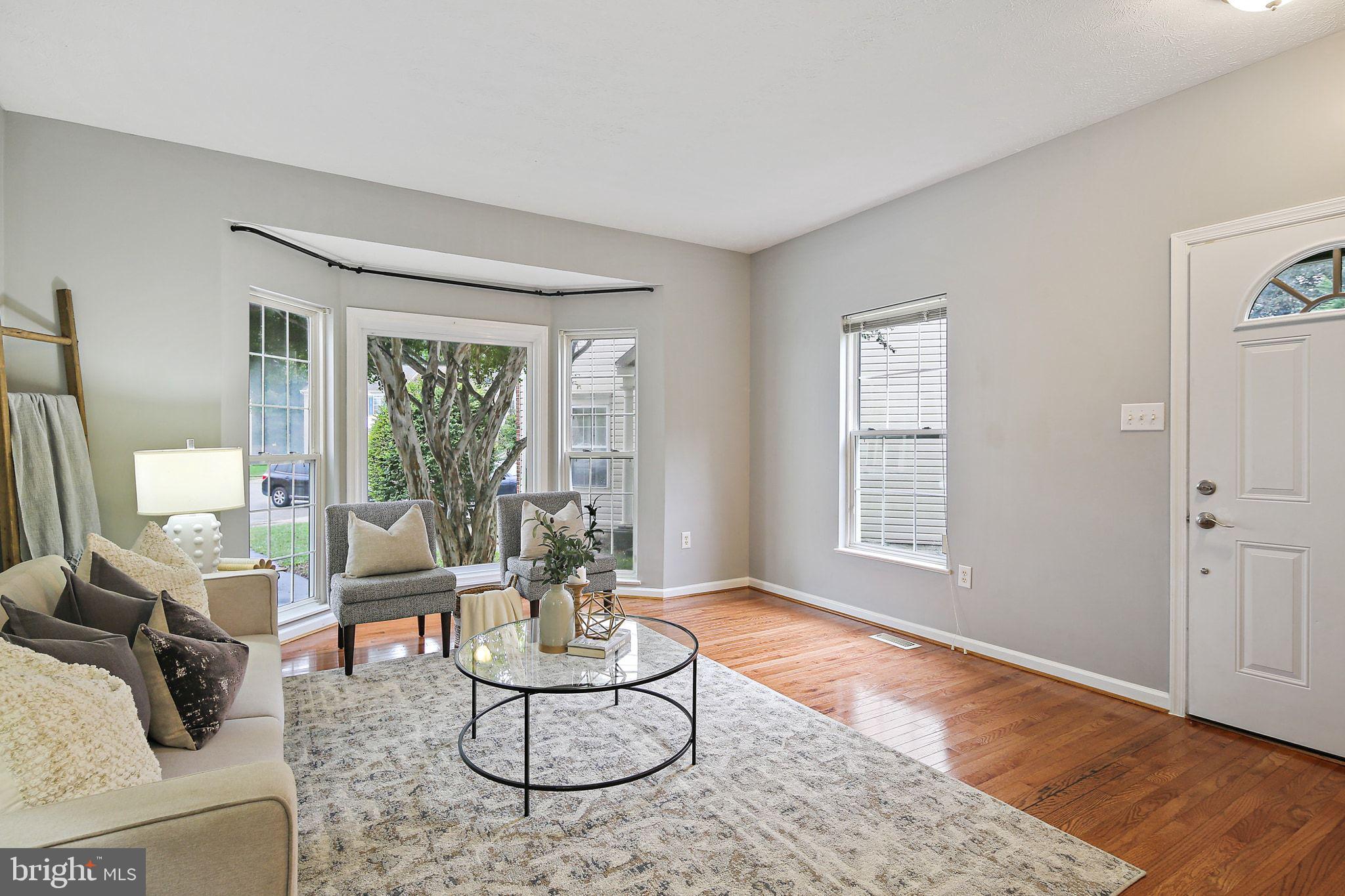 322 Timberbrook Court Odenton, MD 21113 - Photo 3 of 31 a living room with furniture and a large window