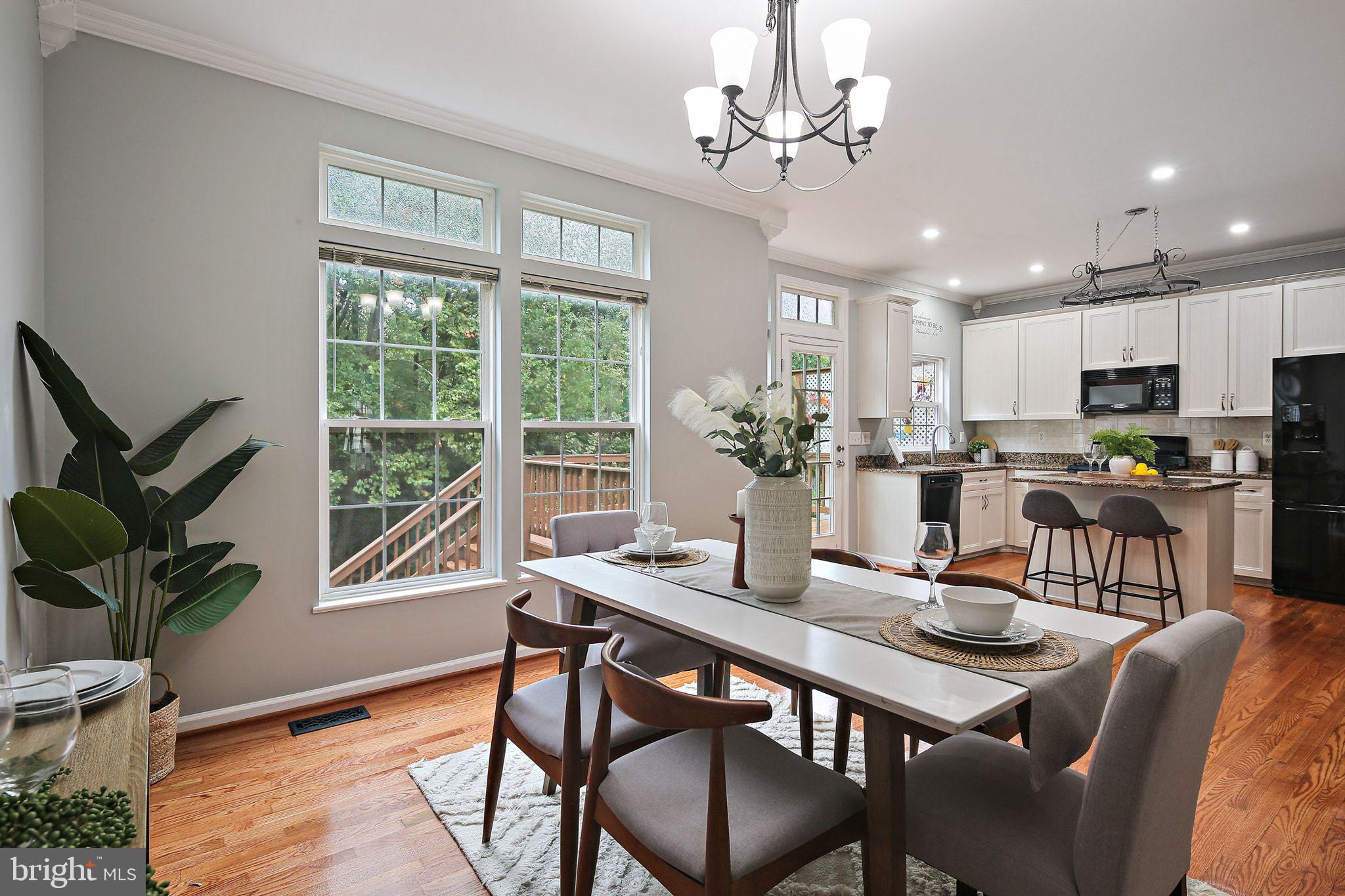 322 Timberbrook Court Odenton, MD 21113 - Photo 7 of 31 a view of a dining room with furniture window and outside view