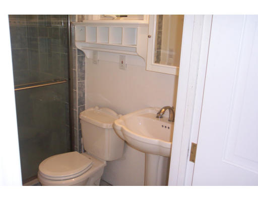 121 Hackensack Road Boston, MA 02467 - Photo 8 of 9 a bathroom with a toilet and a sink
