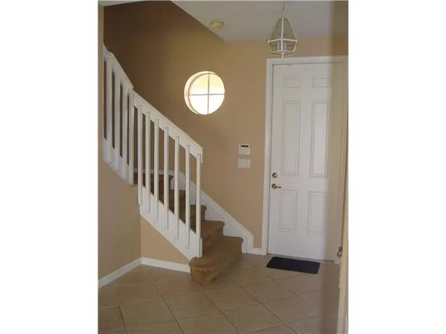 a view of a hallway with entryway