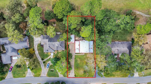 a view of a city with green space