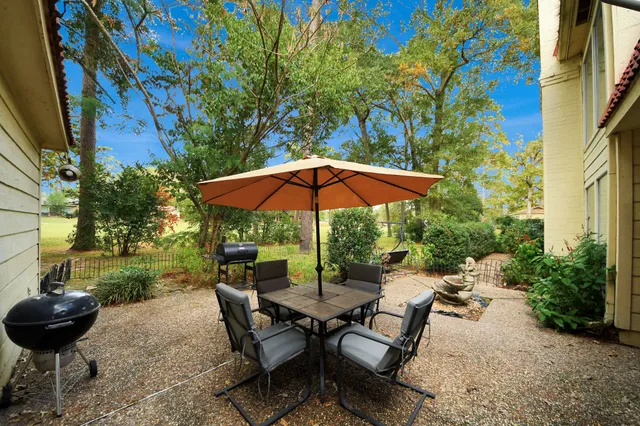 a front view of a house with swimming pool