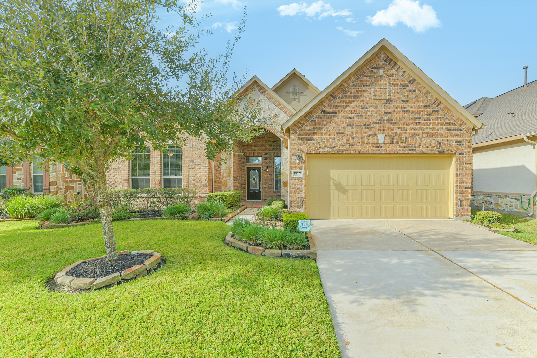 19527 Juniper Breeze Lane Spring, TX 77379 - Photo 1 of 49 a view of a house with backyard and garden