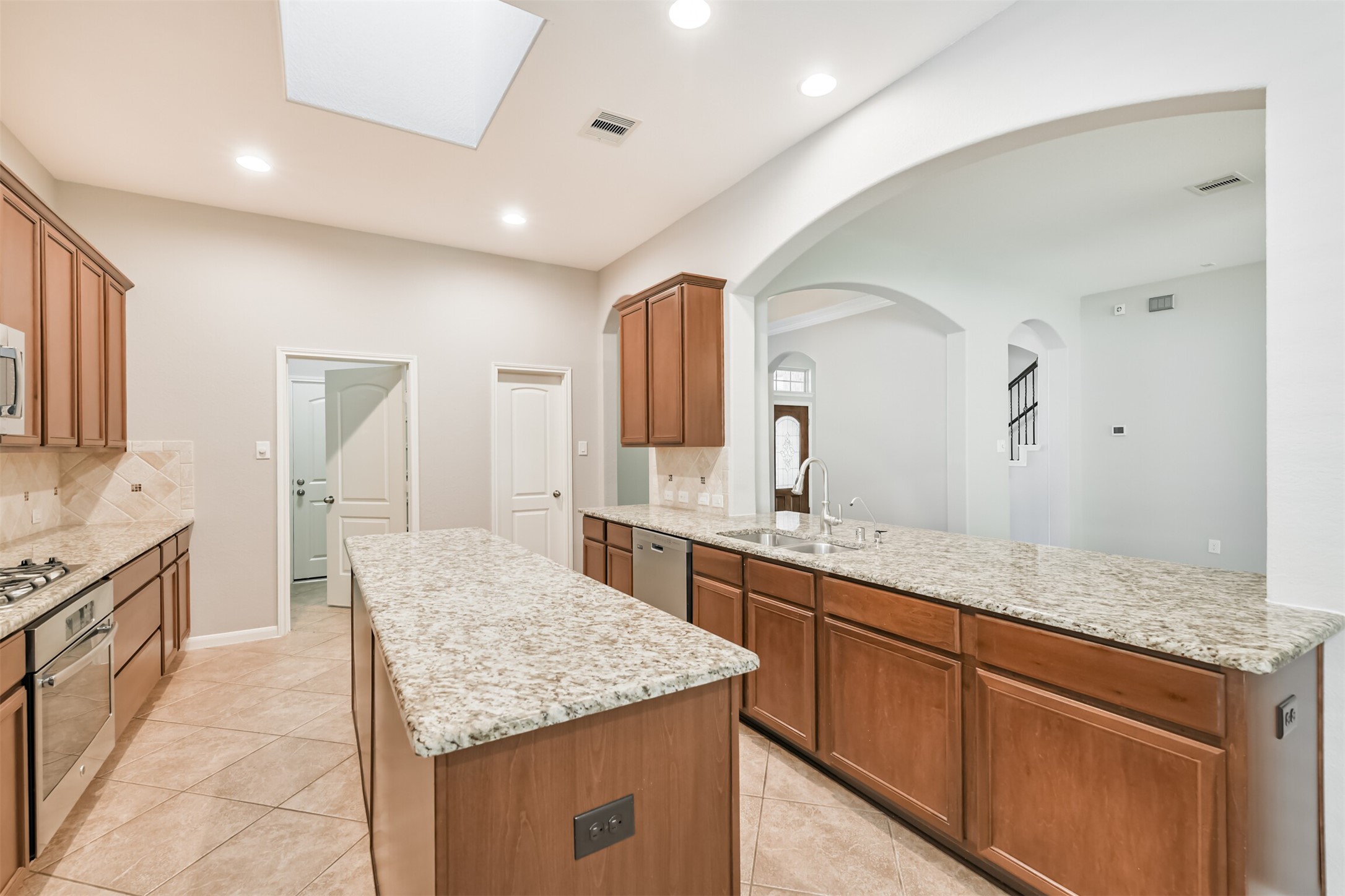19527 Juniper Breeze Lane Spring, TX 77379 - Photo 13 of 49 a bathroom with a granite countertop sink and a mirror