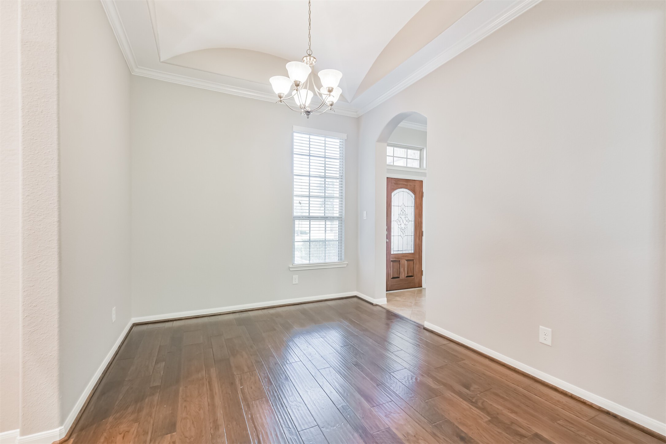 19527 Juniper Breeze Lane Spring, TX 77379 - Photo 20 of 49 wooden floor in an empty room with a window