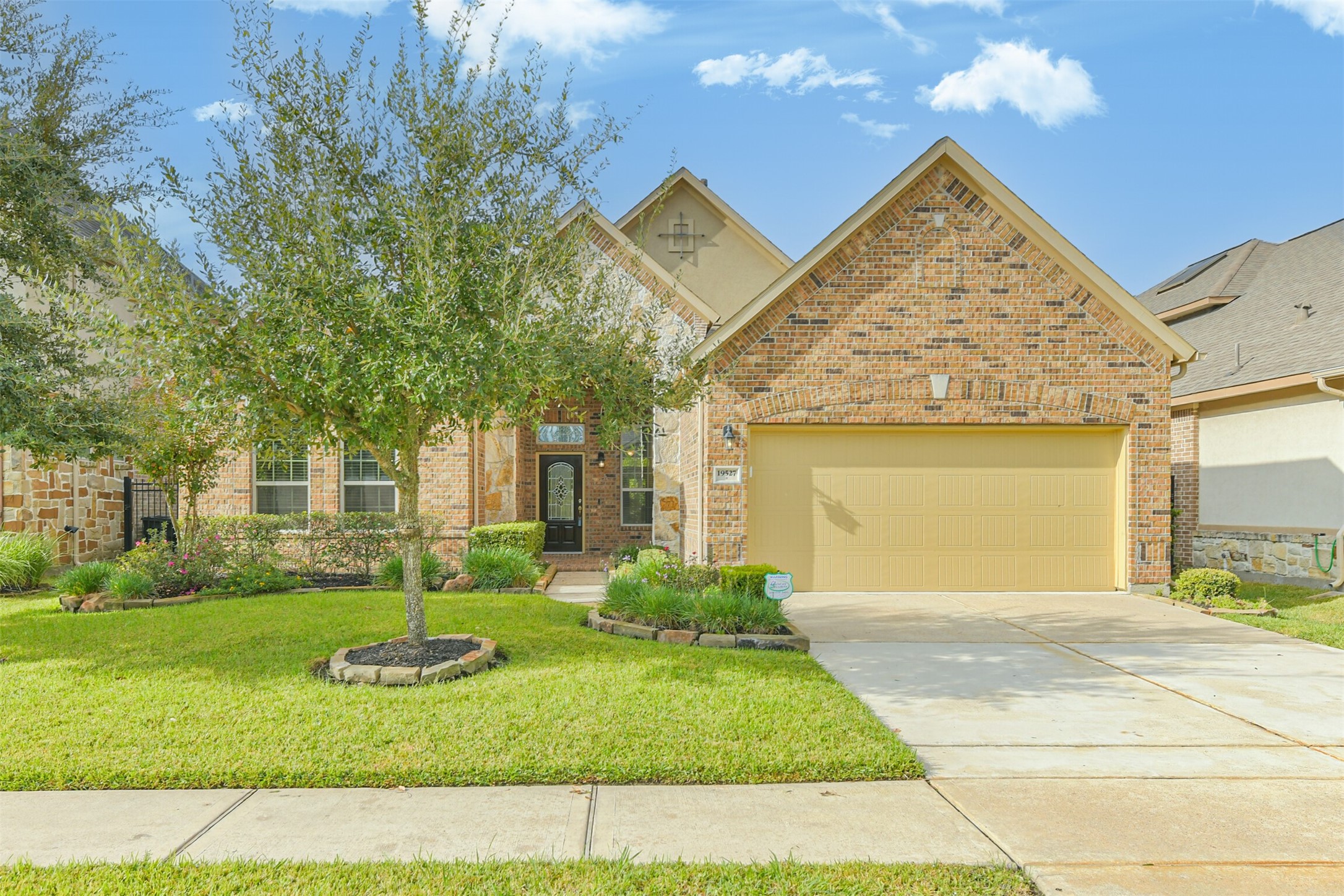 19527 Juniper Breeze Lane Spring, TX 77379 - Photo 2 of 49 a view of a house with a yard
