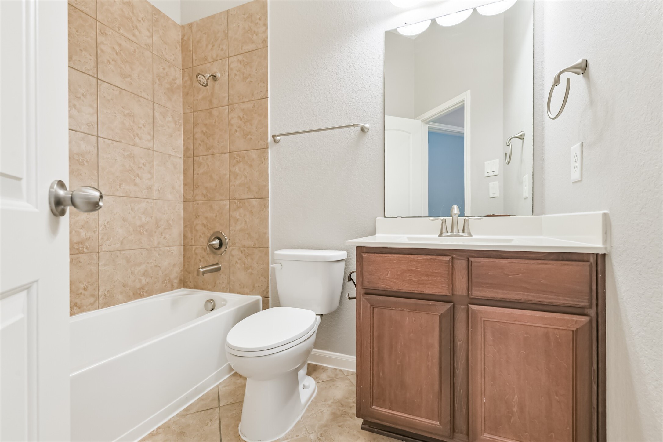 19527 Juniper Breeze Lane Spring, TX 77379 - Photo 30 of 49 a bathroom with a sink a toilet and shower