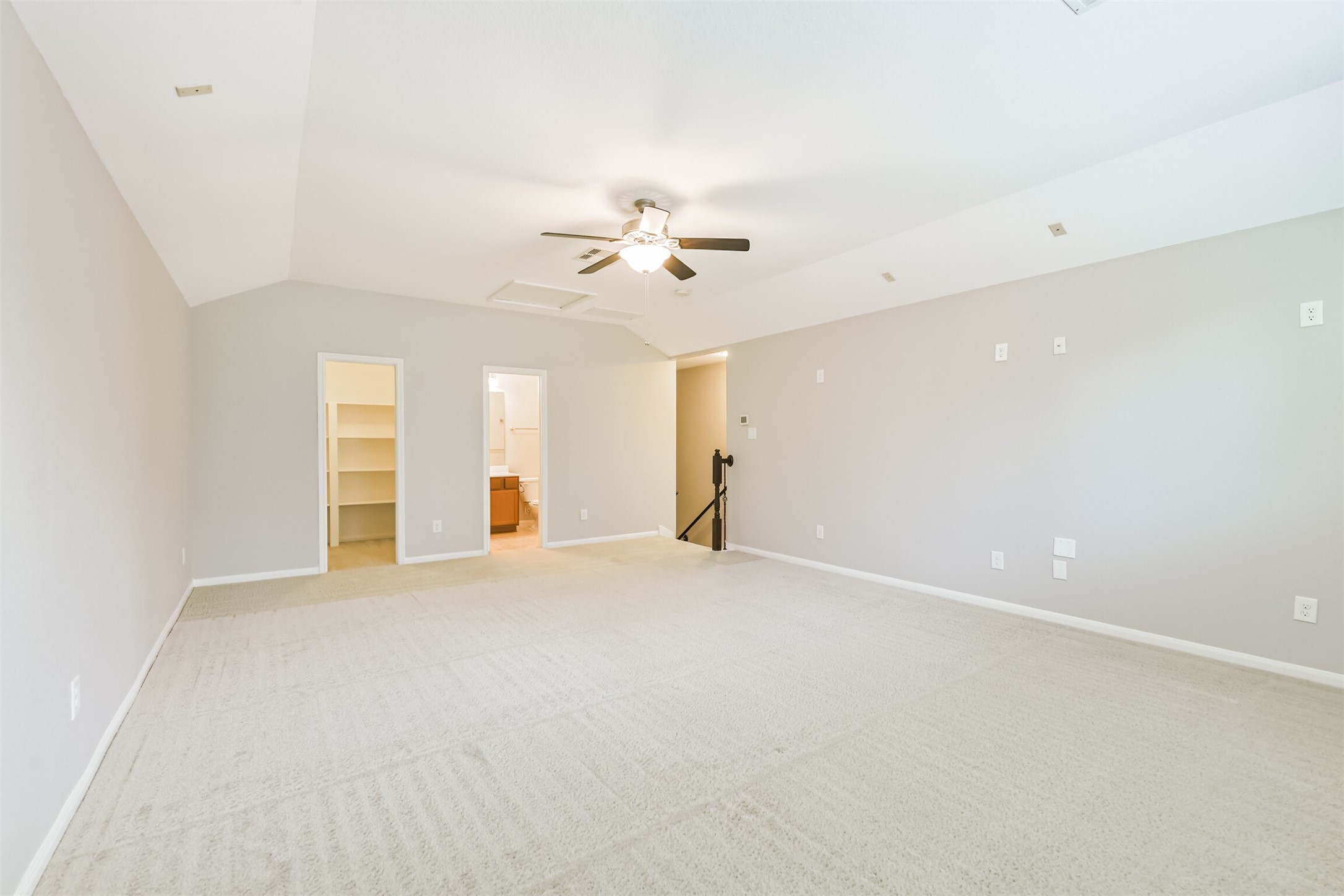 19527 Juniper Breeze Lane Spring, TX 77379 - Photo 37 of 49 an empty room with chandelier fan and windows