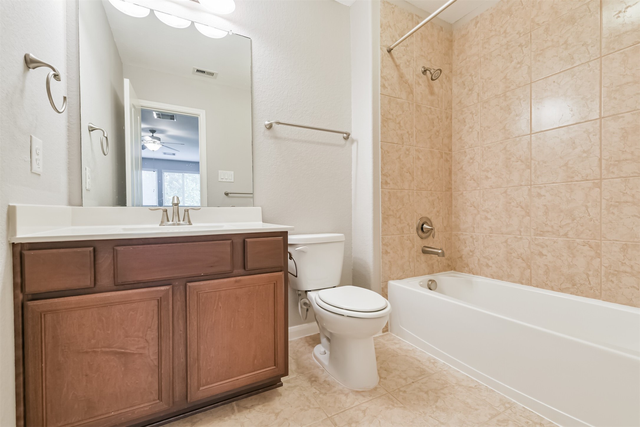 19527 Juniper Breeze Lane Spring, TX 77379 - Photo 38 of 49 a bathroom with a sink toilet and shower
