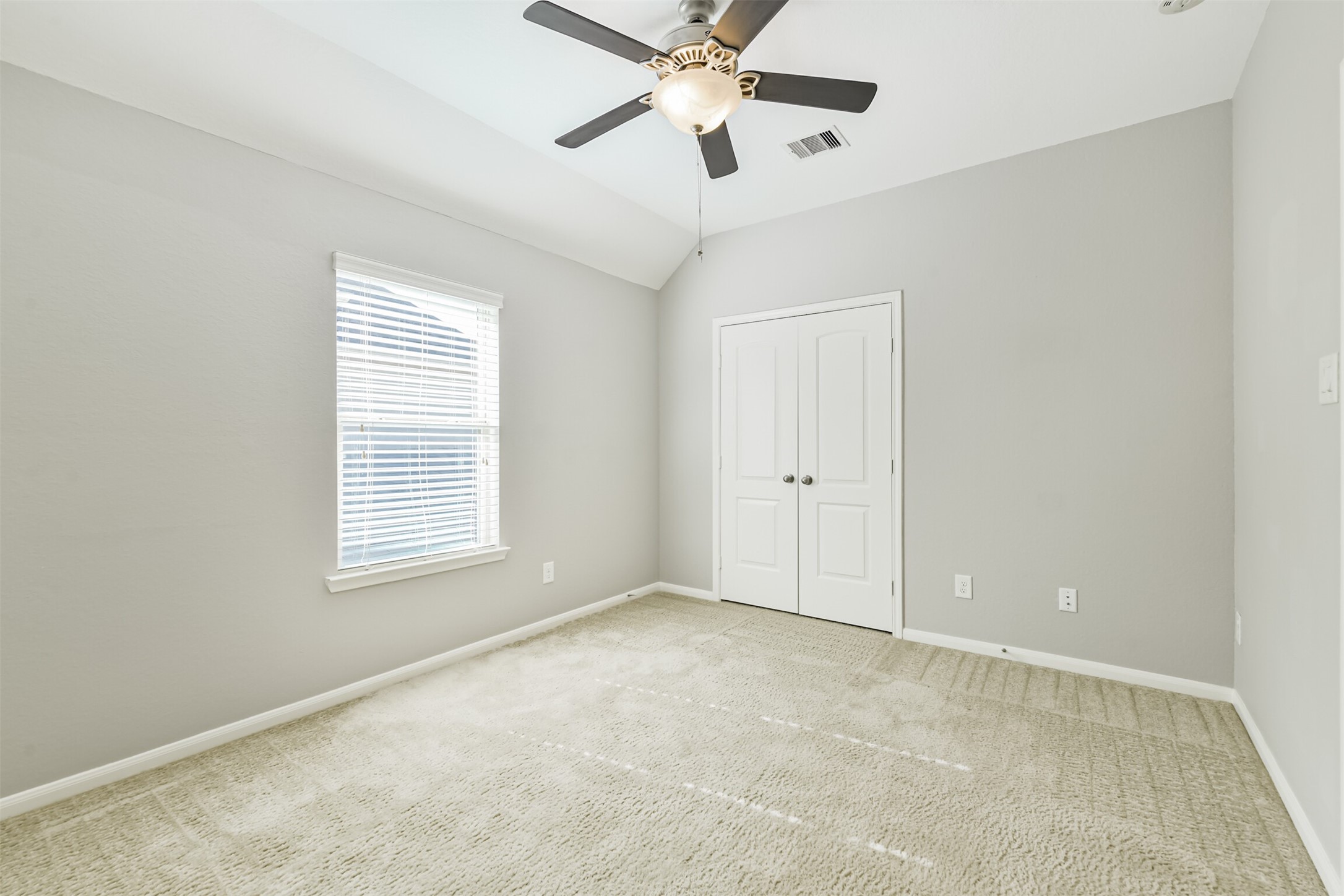19527 Juniper Breeze Lane Spring, TX 77379 - Photo 39 of 49 a view of an empty room with a window