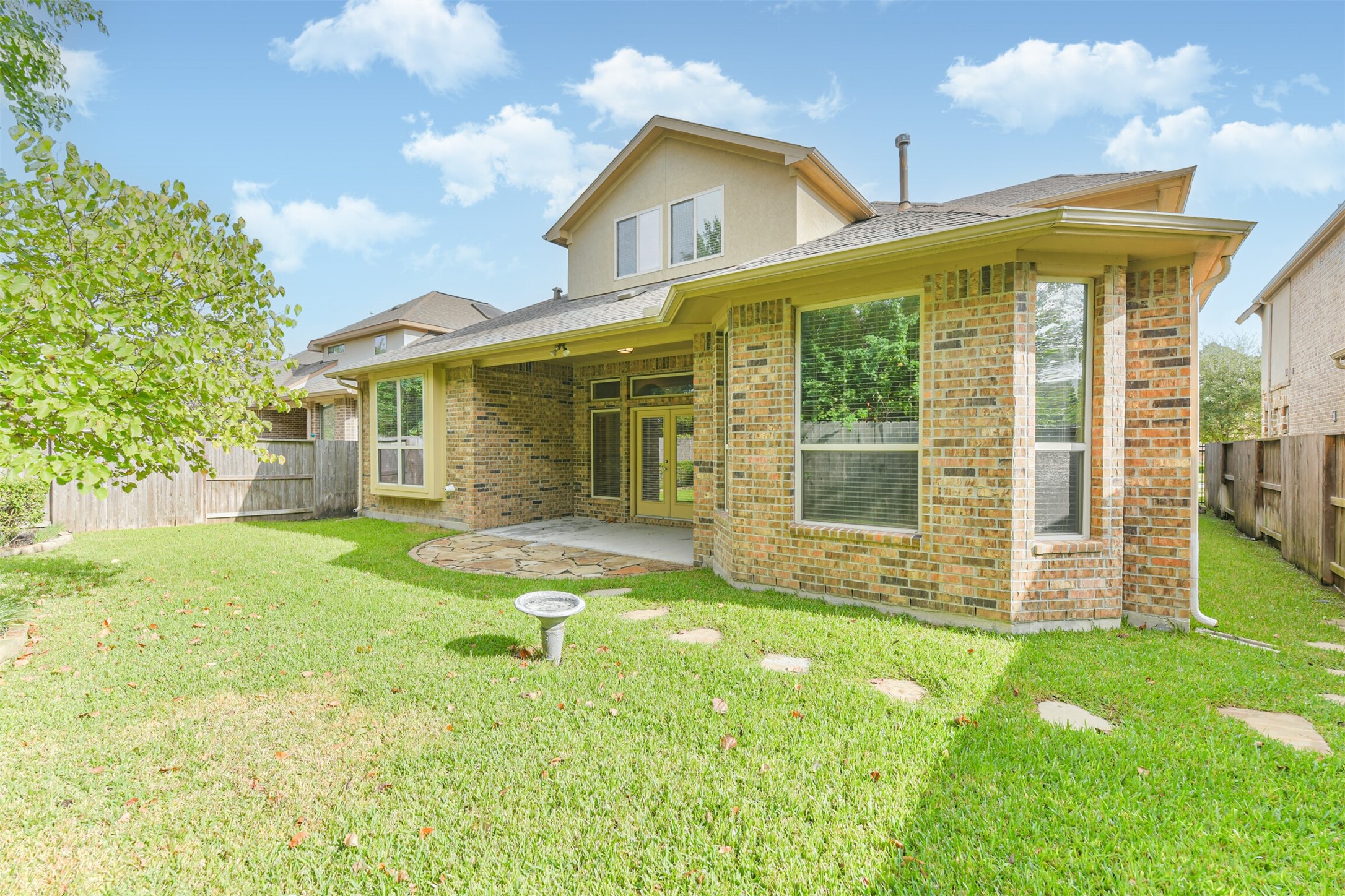 19527 Juniper Breeze Lane Spring, TX 77379 - Photo 45 of 49 a view of a house with a yard and sitting area