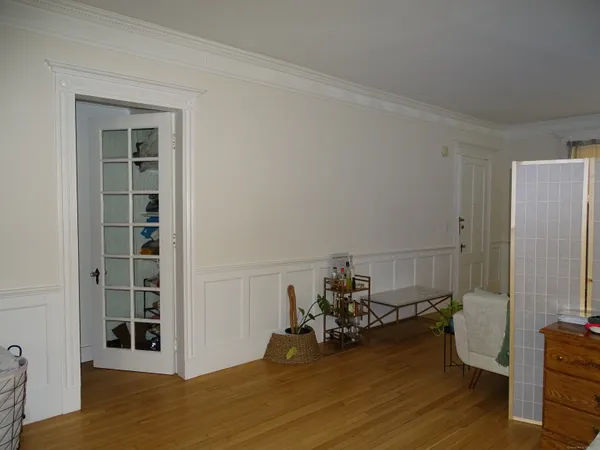 a room with furniture and a dresser