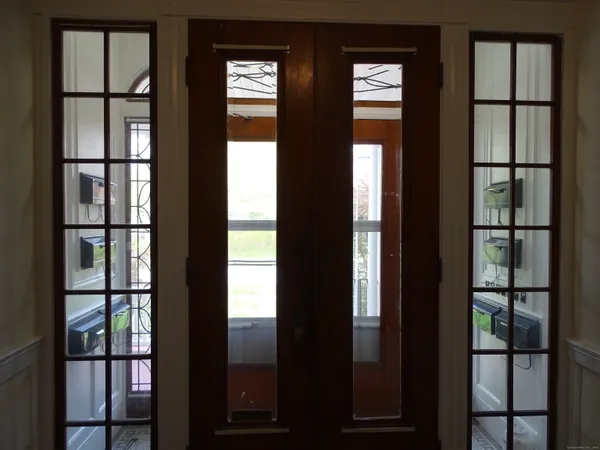 a view of a hallway with closet