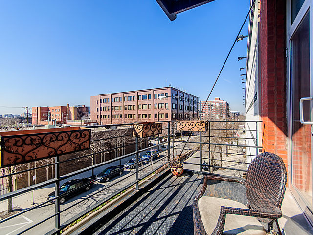 1344 West Madison Street, Unit 303 Chicago, IL 60607 - Photo 16 of 20 a view of a balcony with chairs