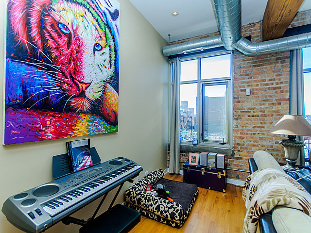 1344 West Madison Street, Unit 303 Chicago, IL 60607 - Photo 5 of 20 a bedroom with furniture and a window