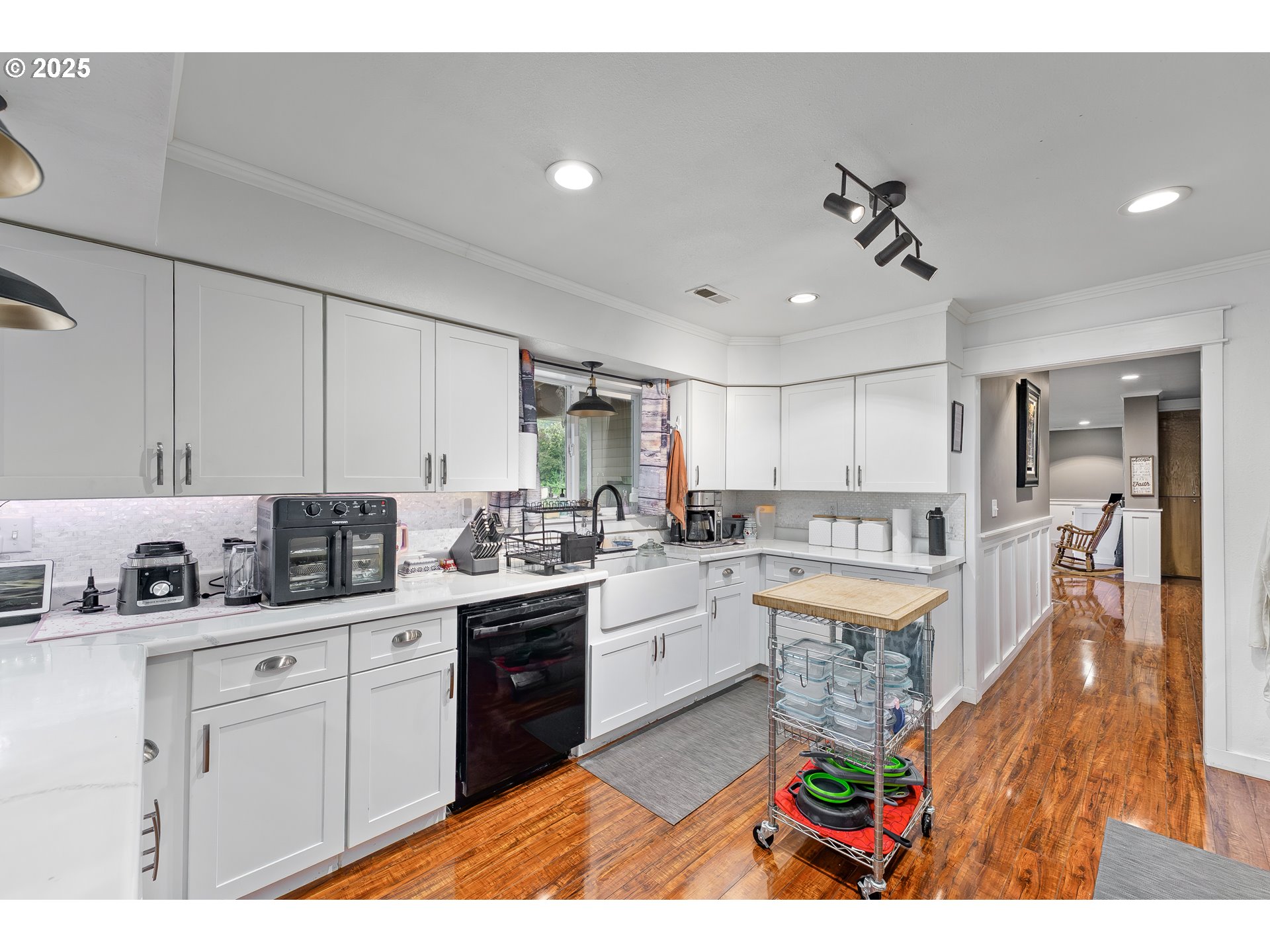 190 Walnut Street Myrtle Creek, OR 97457 - Photo 17 of 48 a kitchen with stainless steel appliances kitchen island granite countertop a sink and cabinets