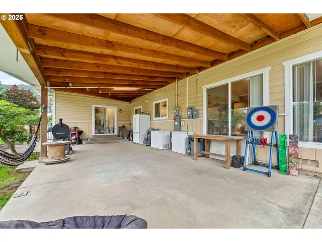 a view of a car parked in front of a house