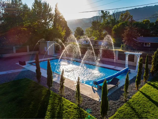 a view of a balcony with chairs