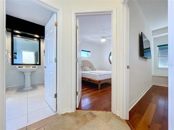a en suite bathroom with a toilet sink and mirror