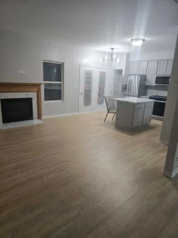 a view of a hallway with windows