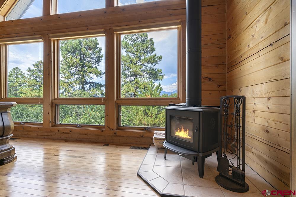 154 N Road Durango, CO 81303 - Photo 14 of 35 a living room with furniture and a fireplace