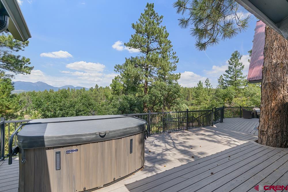 154 N Road Durango, CO 81303 - Photo 30 of 35 a view of a wooden deck and a yard