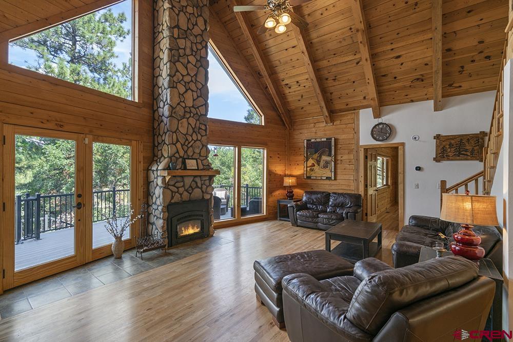 154 N Road Durango, CO 81303 - Photo 4 of 35 a living room with furniture large window and fireplace
