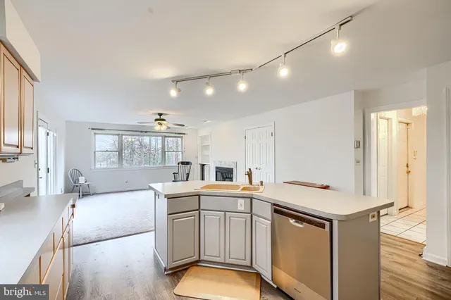 a view of a roof deck with wooden floor and fence