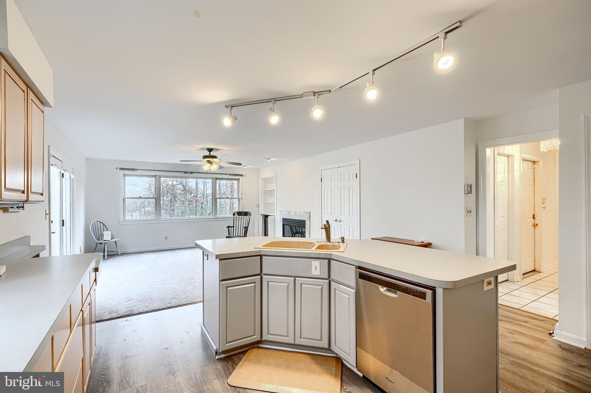 2508 Perring Woods Road Baltimore, MD 21234 - Photo 14 of 42 a kitchen with a sink stove and cabinets