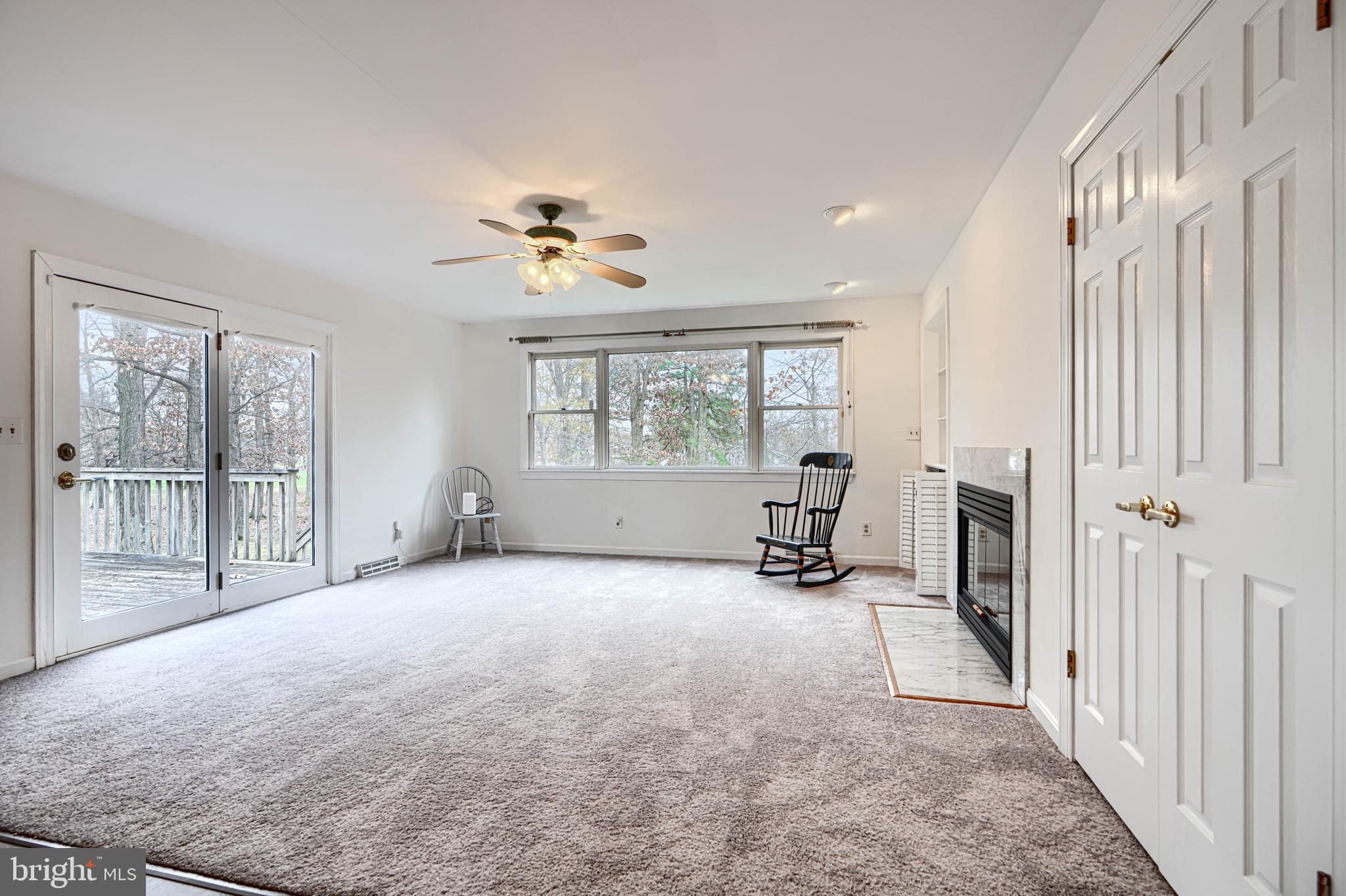 2508 Perring Woods Road Baltimore, MD 21234 - Photo 17 of 42 a big room with wooden floor and windows
