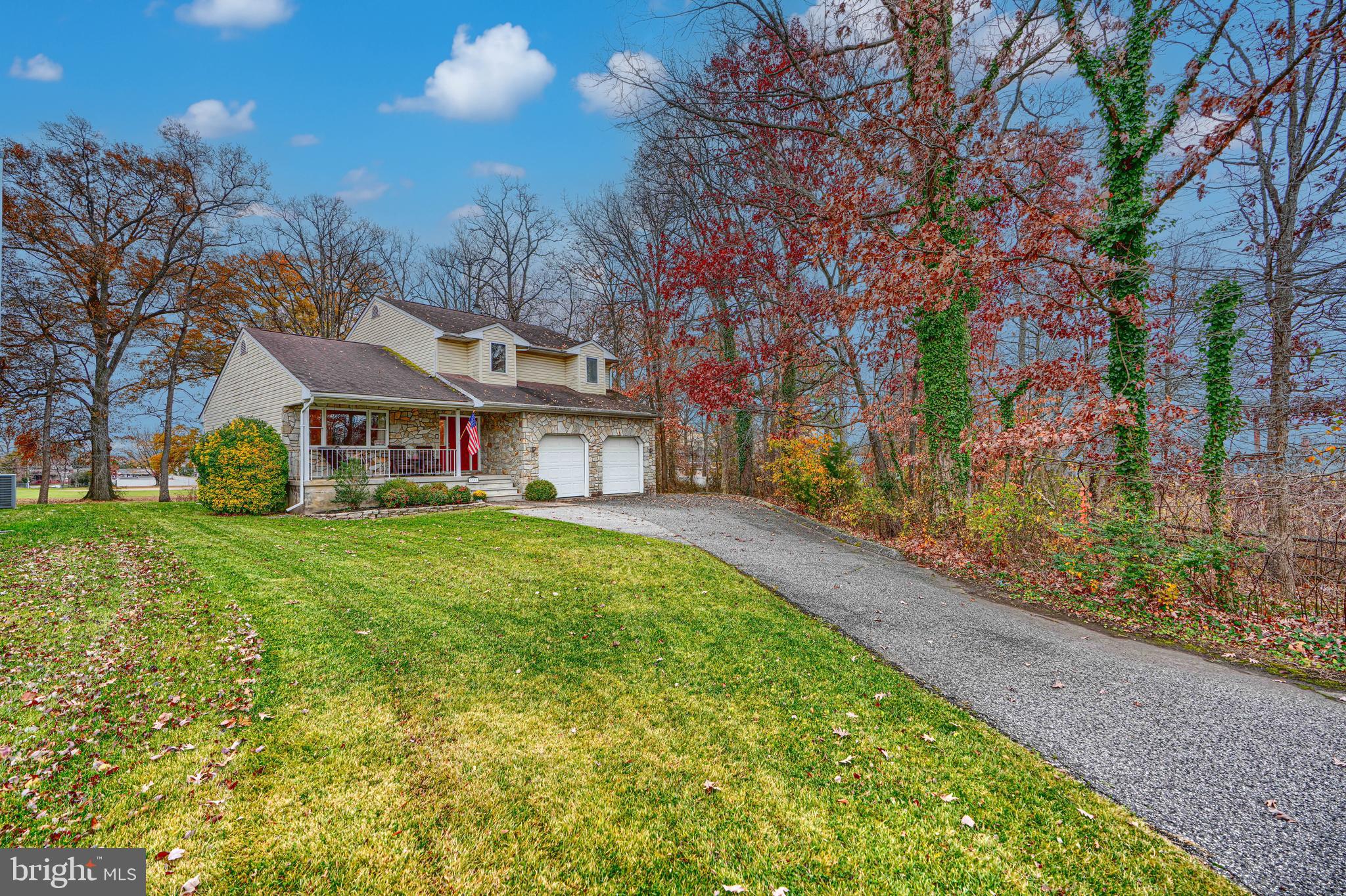 2508 Perring Woods Road Baltimore, MD 21234 - Photo 2 of 42 a view of house with outdoor space and garden